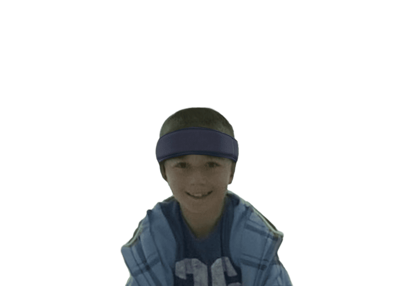 Alex, age 9, is wearing an Ultra JR™ in navy blue