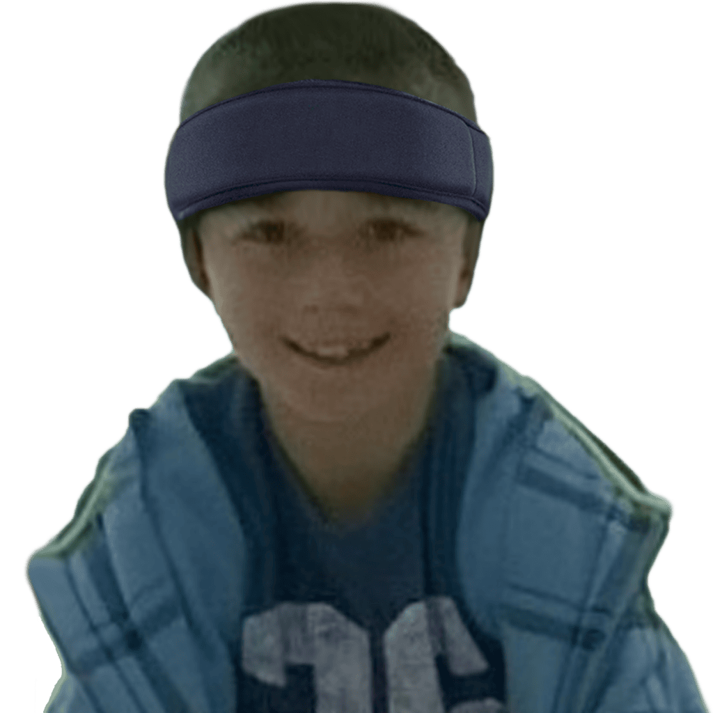 Alex, age 9, is wearing an Ultra JR™ in navy blue.