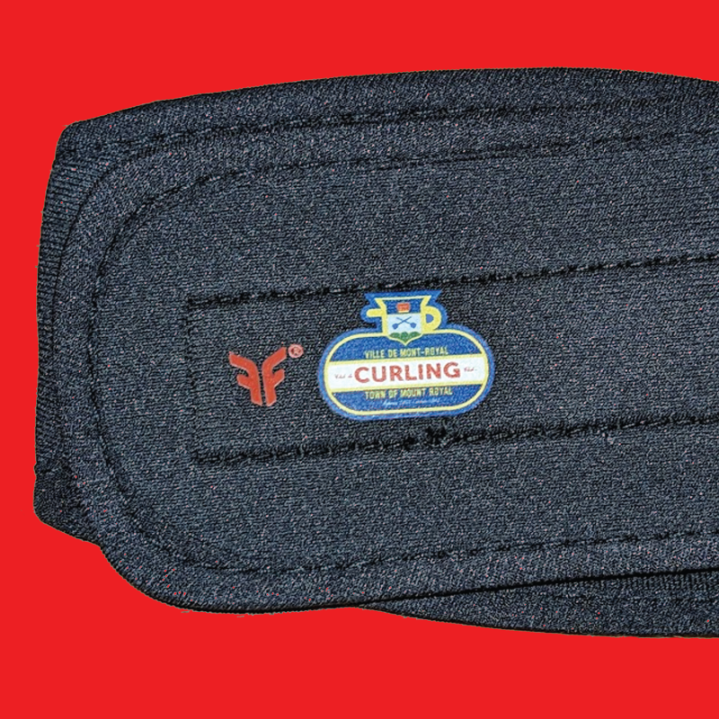 Soft black fabric headband with Forcefield® logo and curling icon on red background.