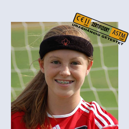 Ivy, age 12, is wearing a size large Protective Sweatband™ in black with a Forcefield® spiritwear leaf emblem.